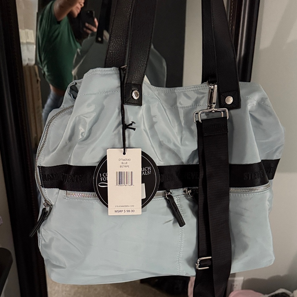 Steve Madden Sky Blue Nylon Shoulder Bag with extra straps for versatility.